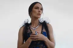 British actress Keira Knightley wears the Graphic Line necklace in white gold, platinum, diamonds, sapphire, rubies and onyx, and rings in white gold, platinum, diamonds, sapphires and onyx.