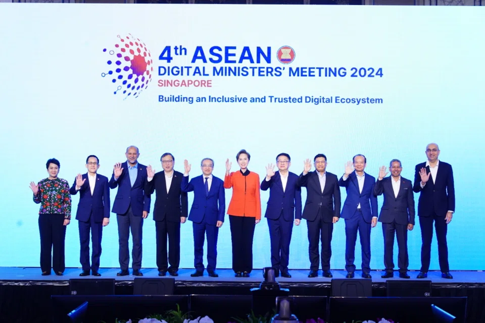 Singapore’s Minister for Communications and Information Josephine Teo (in red) chairs the meeting while Thailand’s Digital Economy and Society Minister Prasert Jantararuangtong (fifth from right) is vice-chair.
