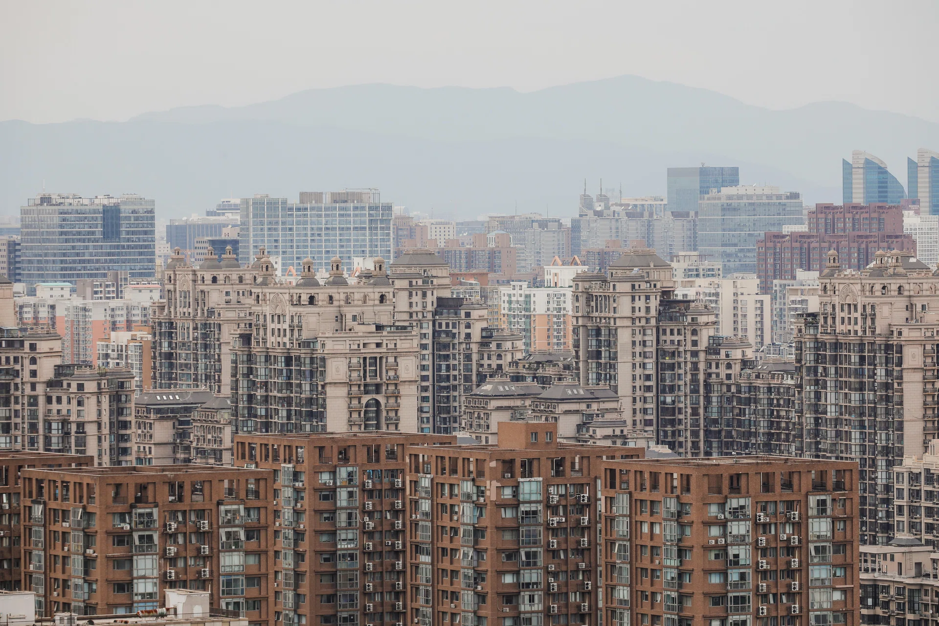 China mulls asking firms run by central government to buy homes: sources
