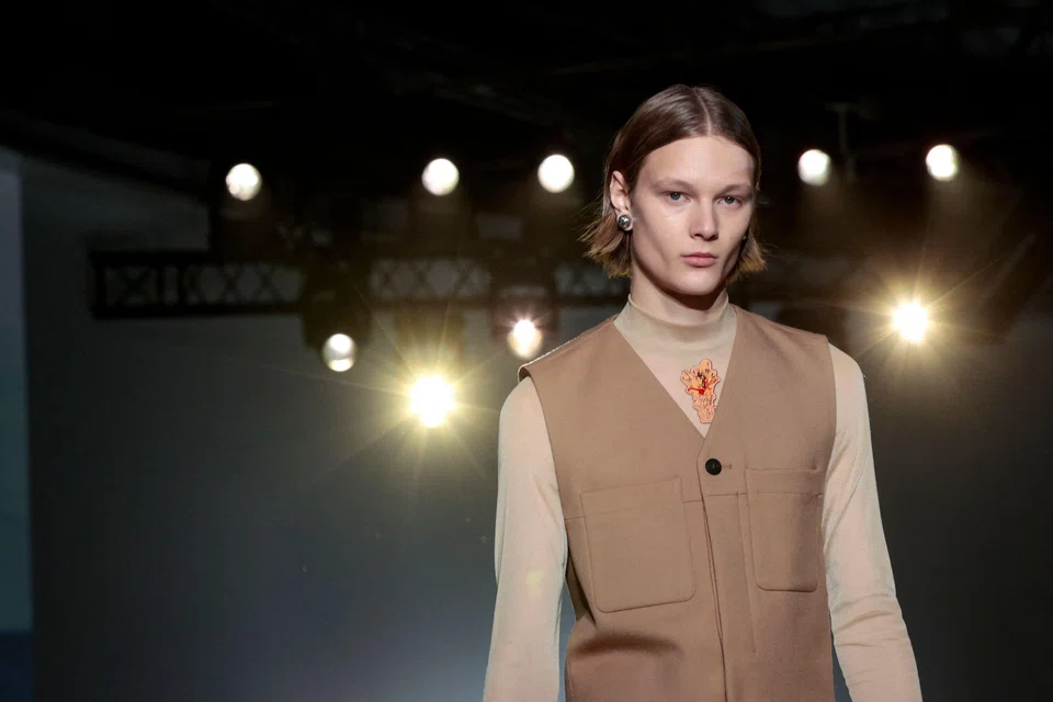 Vests offer a cooler way to look professional. Take a cue from this look by South Korean brand Wooyoungmi.