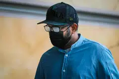 Former Shell employee Muzaffar Ali Khan Muhamad Akram at the Supreme Court on July 2. He and another ex-employee pleaded guilty to multiple offences. 