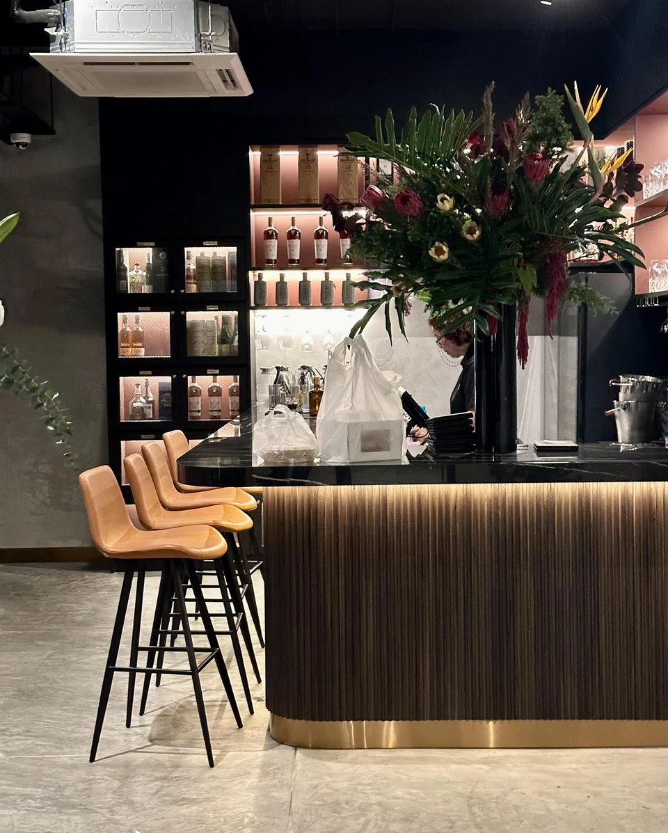 A fancy bar area at the restaurant entrance.