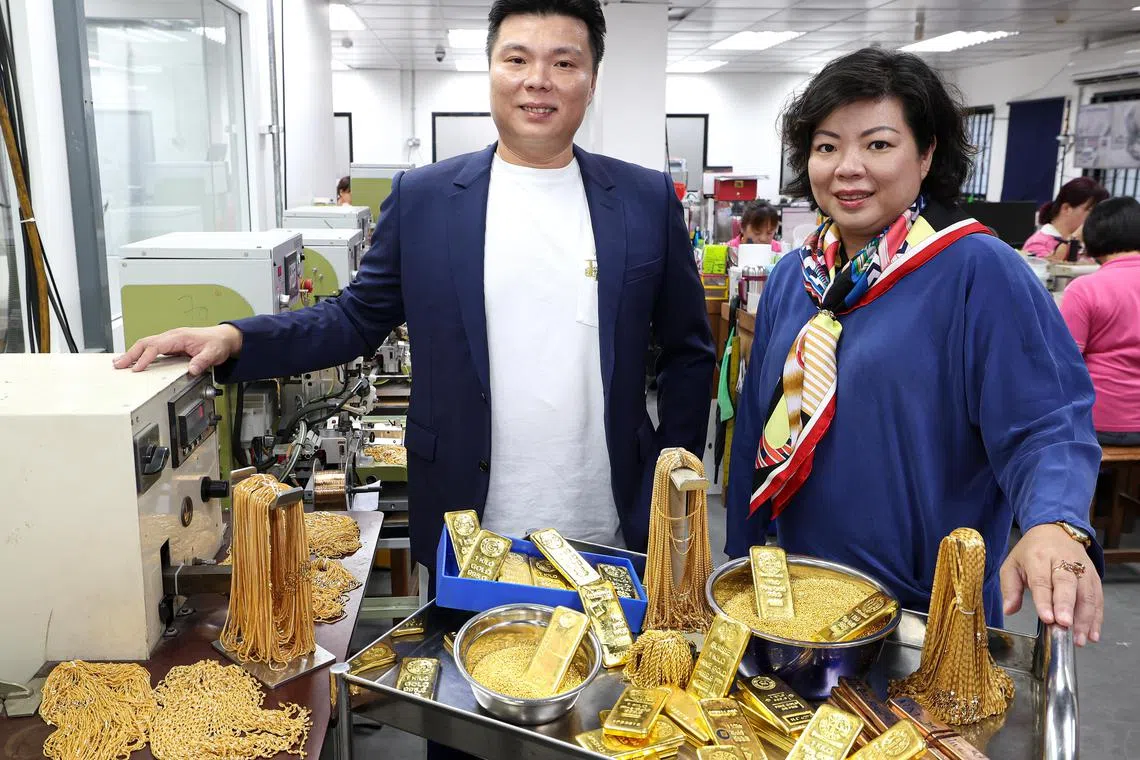 Siblings Calvin Poon (left) and Angeline Poon, both directors at Unigold International, strive to create a healthy culture of teamwork among the company's workers.