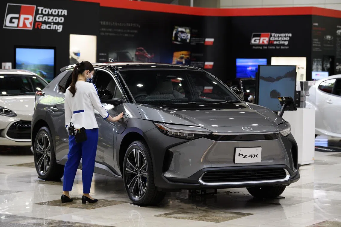 A Toyota bZ4X electric sport utility vehicle (SUV) on display at the company's showroom in Toyota City, Aichi Prefecture, Japan, on Monday, June 13, 2022.  Photographer: Akio Kon/Bloomberg