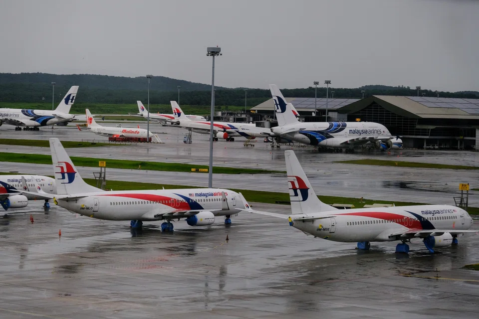 The Malaysian flag carrier will reroute flights to avoid airspace over parts of the Middle East, requiring more fuel and spurring the need to lighten its load.