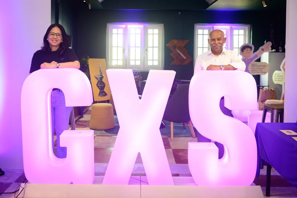 GXS head of retail Jenn Ong (left) and CEO Muthukrishnan Ramaswami.