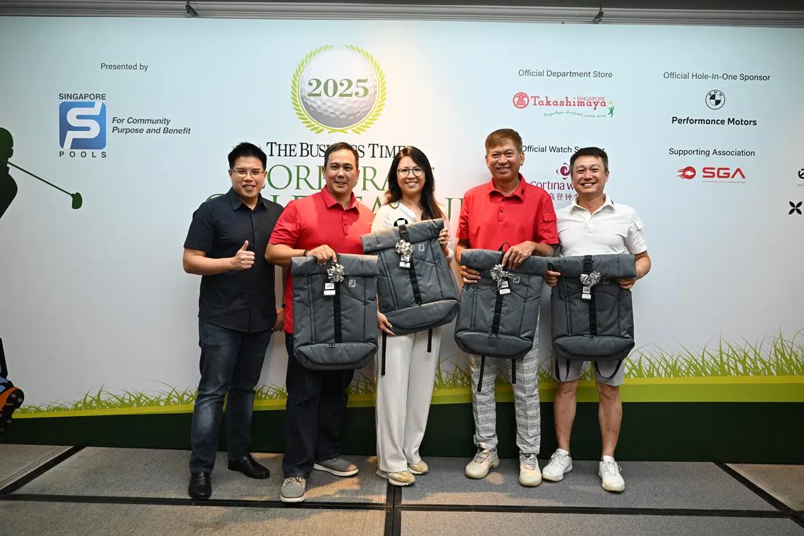 From left: The Business Times news editor Lee U-Wen together with the players from Team Orchid Country Club, Gavin De Luna, Joey Tan, Francis Ong and Cheng Keng Hui.