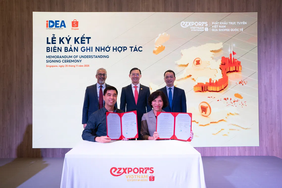 Jason Bay, country head (Vietnam) of Sea (bottom left); Lai Viet Anh, deputy director general of iDEA (bottom right); G Jayakrishnan, executive director (South-east Asia) of Enterprise Singapore (top left); and Tran Phuoc Anh, Vietnam’s ambassador to Singapore (middle), at the MOU signing. 
