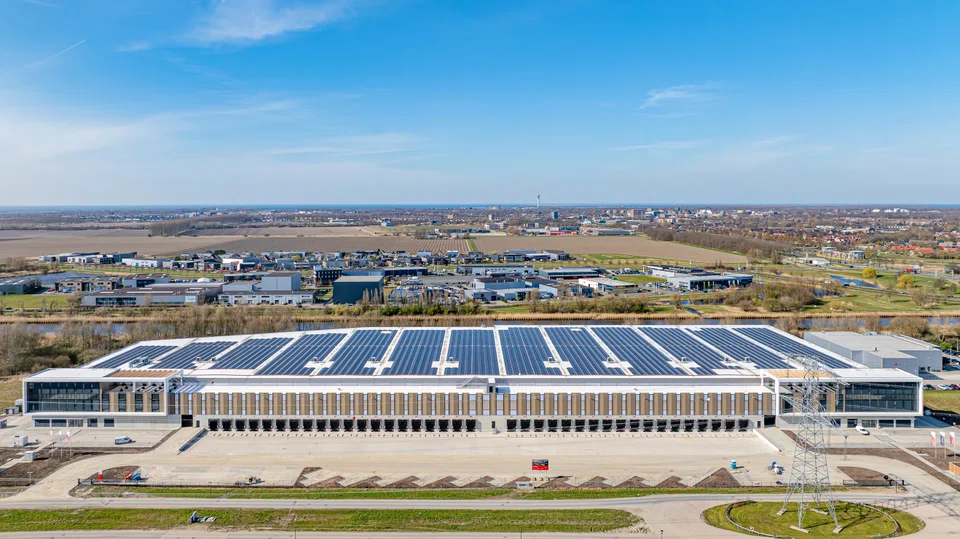 Frasers Property's recently completed industrial development in the Netherlands, The Anchor. The company's surge in net profit was largely due to a net tax credit of S$6.1 million, reversing a tax expense of S$117.5 million in the prior year.