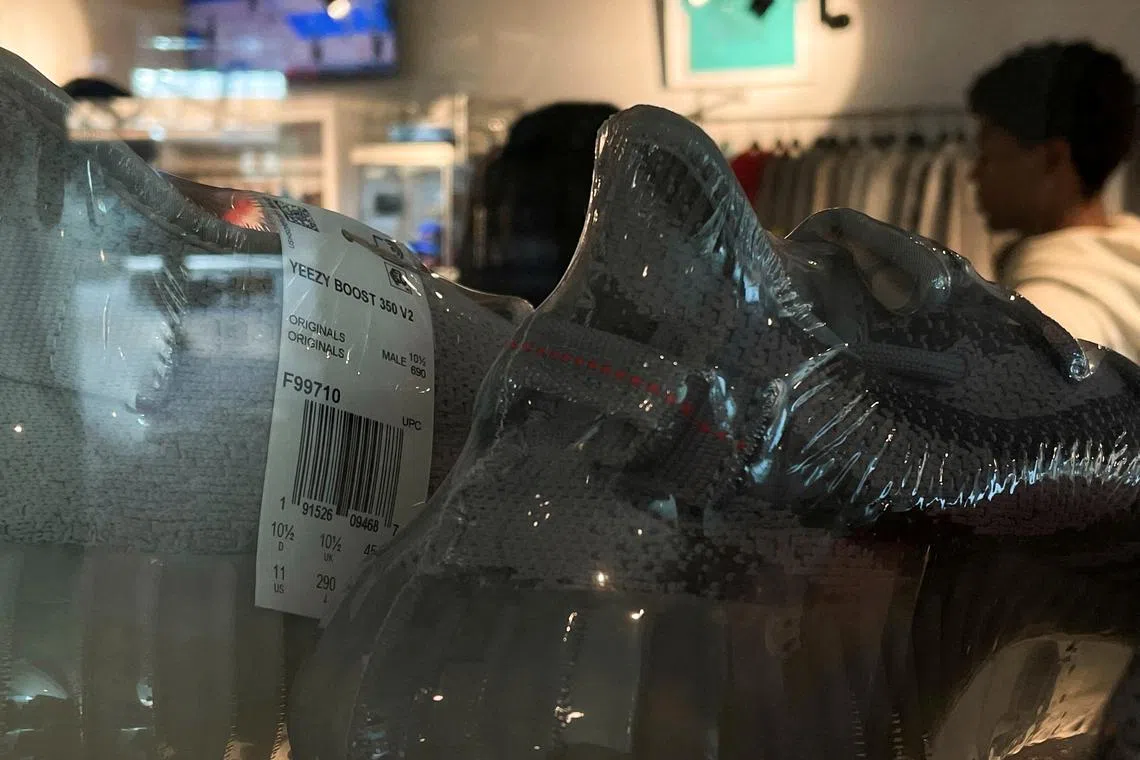 A pair of Adidas Yeezy shoes seen in a store on the day Adidas terminated its partnership with the American rapper and designer Kanye West, now known as Ye, in Garden City, New York, US, October 25, 2022.