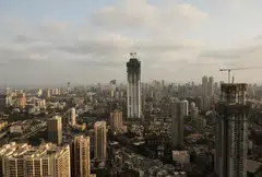 Above: The Mumbai skyline. For the current financial year, the government estimates the economy will expand by 7.4%, driven by consumption and investment.