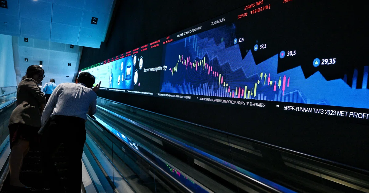 Singapore stocks close higher midweek ahead of Fed rate decision; STI ...