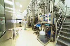 A biotechnologist overseeing the fermentation process, which is key in vaccine manufacturing, at GSK's plant in Singapore.