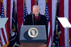 US President Donald Trump's comments meanwhile showed him once again bucking a trend of US presidents historically avoiding politically partisan messages when addressing service members or commemorative events.