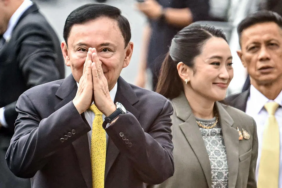 Former Thai PM Thaksin Shinawatra (left) was sentenced to one year in jail on Sep 9. Next to him is his daughter, ex-PM Paetongtarn Shinawatra, who was recently ousted from office.