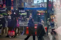 While chip stocks rallied, several market heavyweights such as Apple and Microsoft fell to keep gains in check on the S&P 500 and Nasdaq.