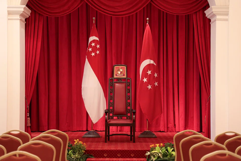 The President's chair at the Istana, flanked by the state and presidential flags. More than 2.7 million voters are eligible to vote at the Presidential Election on Sep 1.
