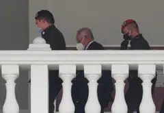 Former Malaysian Prime Minister Najib Razak is escorted by the prison officers during a break of his second trial related to the 1Malaysia Development Berhad scandal at the Kuala Lumpur Court Complex in Kuala Lumpur on Thursday (Aug 25).