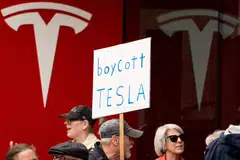 Demonstrators gather at a protest against Elon Musk and Tesla in February in Seattle. Musk’s political antics have devalued his brand in many parts of the world.