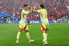 Spain forward Ferran Torres (left) celebrating with defender Daniel Vivian after scoring his team's only goal against Albania.