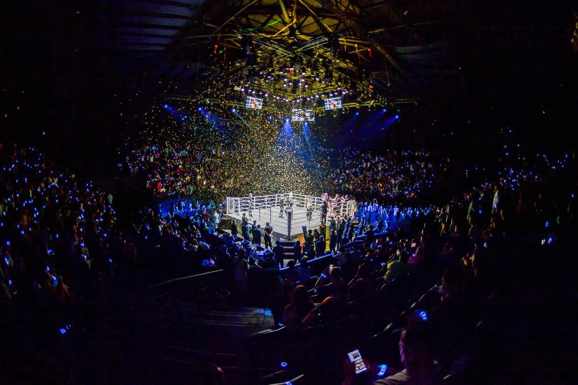 A bird's eye view of the crowd inside the Lumpinee Boxing Stadium in Bangkok for one of the weekly One Friday Fights events.