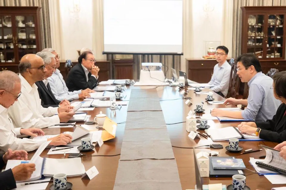 President Tharman Shanmugaratnam at a briefing with the Council of Presidential Advisers, Minister for Finance Lawrence Wong and his Ministry officials.  