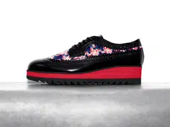 The Onitsuka Brogue in black leather, with a three-dimensional multicoloured tweed.