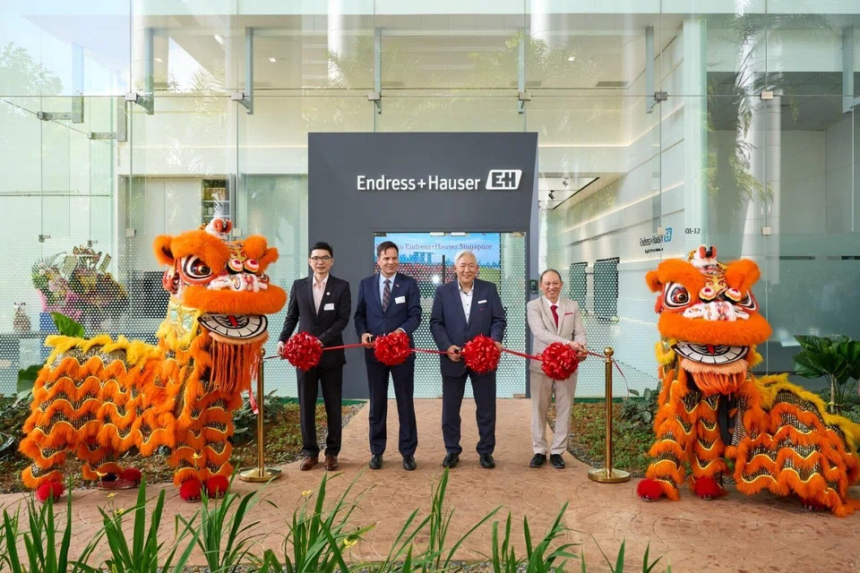 From left: Soo Haw Yun, EDB vice-president for global enterprises; Frank Grutter, Swiss ambassador to Singapore; Richard Yu, Endress+Hauser Singapore managing director; and Henry Chia, Endress+Hauser corporate sales director.