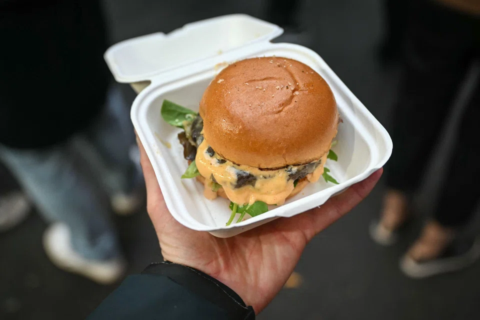 A venison burger at a popular market in London. Britain's deer population has exploded from 450,000 in 1970 to two million today.
