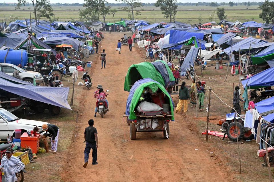 Displaced people arrive at a temporary camp in Cambodia. The unmanned aerial vehicles (UAVs) were detected flying from the Cambodian side on Sunday, intruding into Thailand’s sovereign territory.