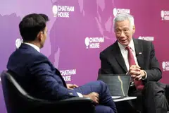 Lee Hsien Loong (right) noted that the world order has come a long way towards unravelling, amid the US-China rivalry and the trade imbalances and tensions between countries. The Senior Minister was speaking at a Chatham House dialogue on Oct 27.
