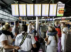 FlightAware said more than 21,000 flights were slowed globally, and travel disruptions were expected to stretch into the coming days. 