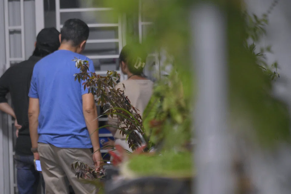 ST journalists Andrew Wong and Nadine Chua at Bedok resident JJ's (not pictured) HDB flat last month.