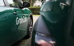 Ride-hailing operator Grab says it would partner China’s WeRide to begin services next year.