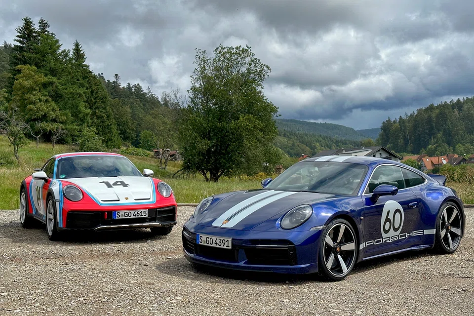 While the 911 Dakar (left) is a hyper-cool homage to Porsche’s big win at 1984’s Paris-Dakar Rally, the Sport Classic (right) celebrates the 911’s evolution into a hardcore sportscar and racing legend.