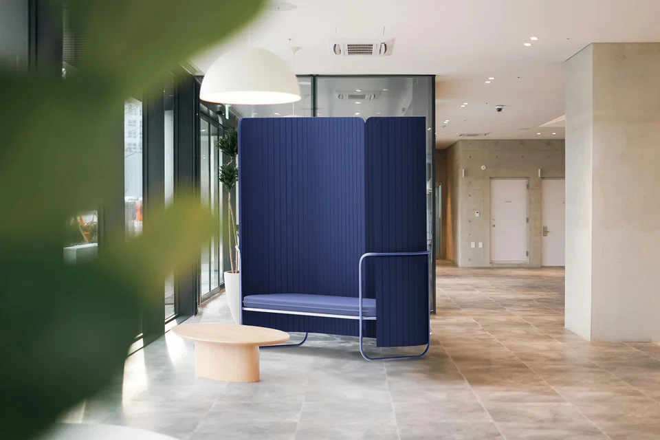 The Flutes bench acts as an acoustic pod in a home or office environment.