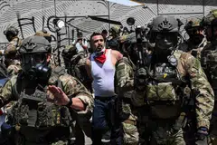 Police said 197 people had already been arrested on Tuesday - more than double the total number of arrests to date.