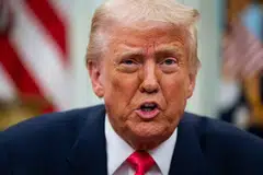 US President Donald Trump signed orders on Thursday to delay fresh levies for Canadian and Mexican imports covered by a North American trade agreement, though he dismissed suggestions that his decisions were linked to market turmoil.