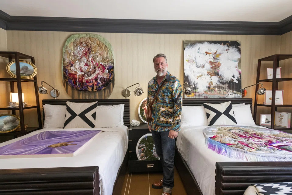 K Contemporary turned a wall piece by textile artist Anne von Freyburg into a bedspread, stationed two human-like sculptures by Viktor Freso on the terrace, and hung a painting by Marc Dennis over the toilet.  “I love taking artwork out of that idea of the white cube,” gallery owner Doug Kacena says.