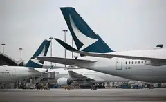 Cathay Pacific, which made heavy losses and layoffs during the Covid-19 pandemic, reported its first annual profit in four years in March, and paid its first dividend since 2019.