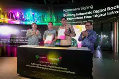 Indosat Ooredoo Hutchison's CEO Vikram Sinha (second from right) at the deal signing on Dec 23. The announcement marks one the largest digital infrastructure transactions in Indonesia.