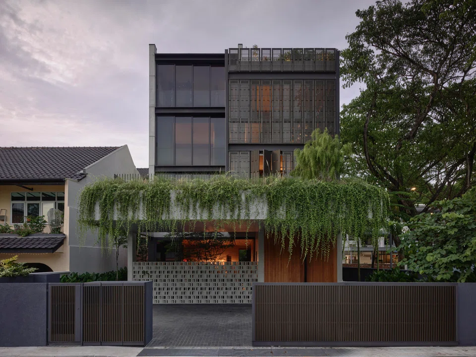 Breeze blocks separate the car porch from the courtyard.