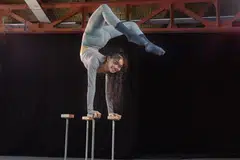 Beverly Wan, performing a scorpion handstand, says her next circus project in 2026 will be bigger and better. 