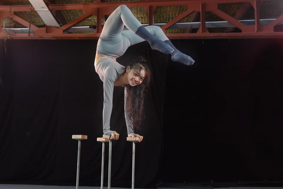 Beverly Wan, performing a scorpion handstand, says her next circus project in 2026 will be bigger and better. 