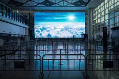 An empty area for passengers heading to quarantine in the arrival hall at Hong Kong International Airport. 