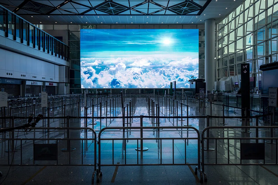An empty area for passengers heading to quarantine in the arrival hall at Hong Kong International Airport. 