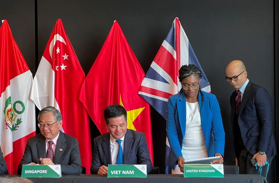 UK Secretary of State for Business and Trade Kemi Badenoch (in blue jacket) at a meeting of trade ministers in New Zealand on Jul 16, 2023. On her right are Singapore's Trade and Industry Minister Gan Kim Yong and Vietnam's Minister of Trade and Industry Nguyen Hong Dien.