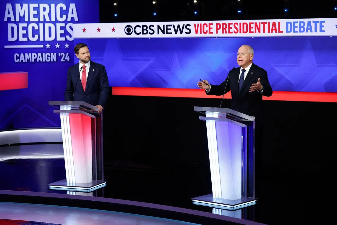 Republican vice-presidential candidate JD Vance (left) and Democratic candidate Tim Walz at the debate at the CBS Broadcast Center in New York, on Oct 1. 
