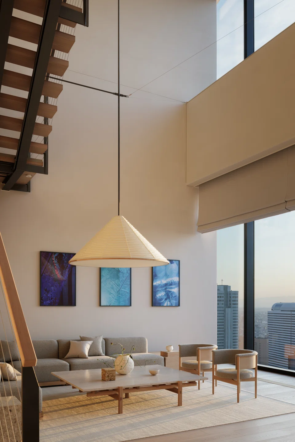 The spacious Tori penthouse with its staircase leading to the loft bedroom.