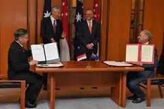 Singapore’s Minister for Trade and Industry Gan Kim Yong (left) and Australia’s Minister for Trade and Tourism Don Farrell signed the GEA in the presence of both prime ministers.